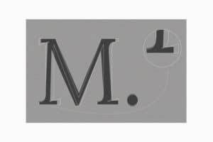 feuille gris foncé sur fond gris clair présentant la lettre M et un zoom sur son jambage inferieur de la typographie Lora Laiko